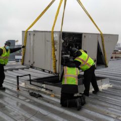 Three ITS Team Members Removing Old Rooftop Unit