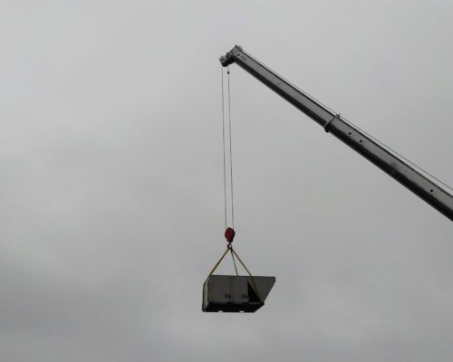 Crane Moving The Old Rooftop Unit